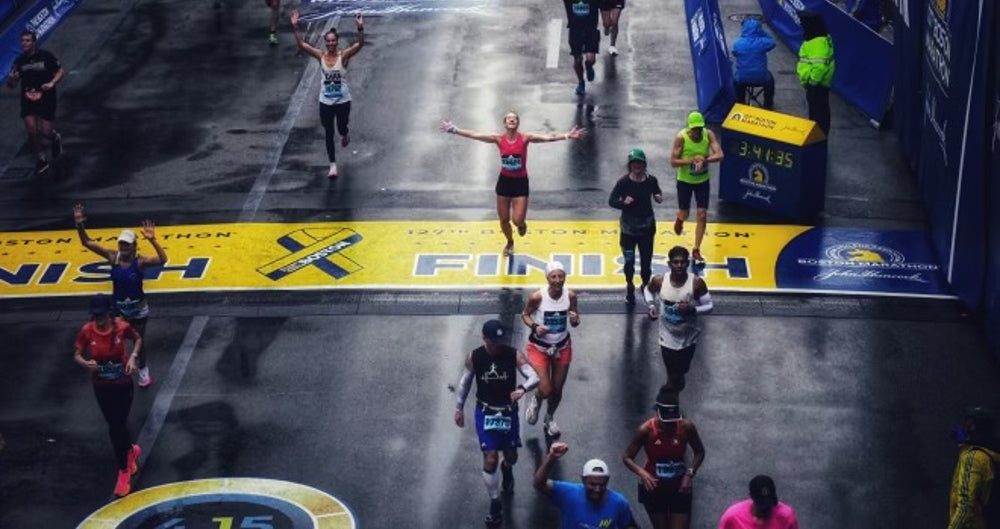 Amber Rollack runs the 2023 Boston Marathon.