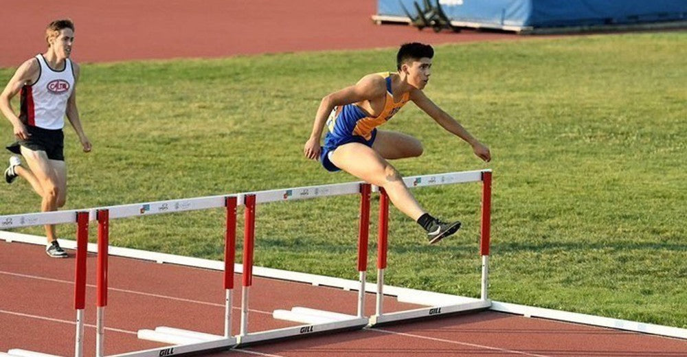 Angel Tenorio competes in the 400-metre hurdles.