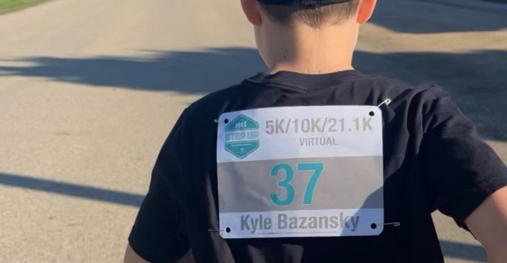One of Kyle Bazansky's sons runs Step Up For Mental Health in his memory.