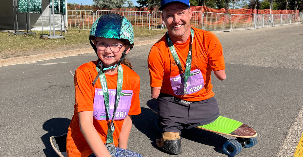 Milania Keeler (L) and Chris Koch at the 2022 GMS Queen City Marathon family 5km event.